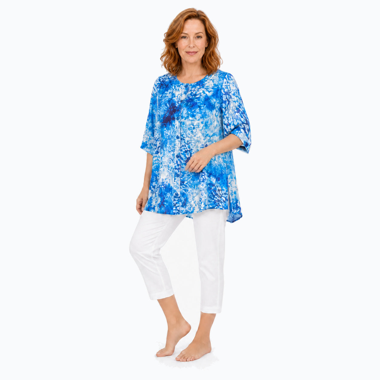 Woman wearing the Claire Powell Snowcat A-Line Tunic Shirt, three-quarter full-body view