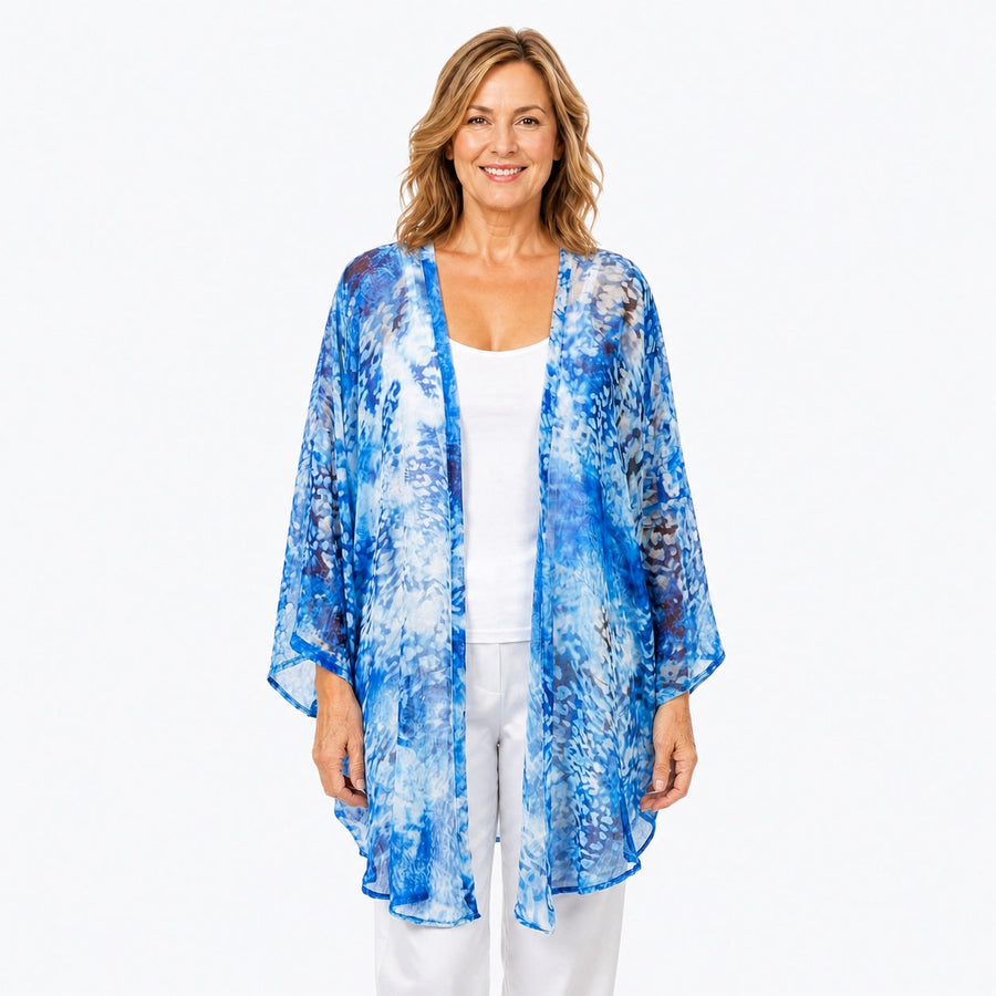 Woman wearing the Claire Powell Snowcat Cotton Chiffon Kimono Cover-Up, front view