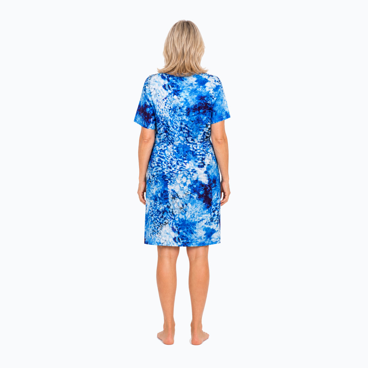 Woman wearing the Claire Powell Snowcat Shift Dress, back view
