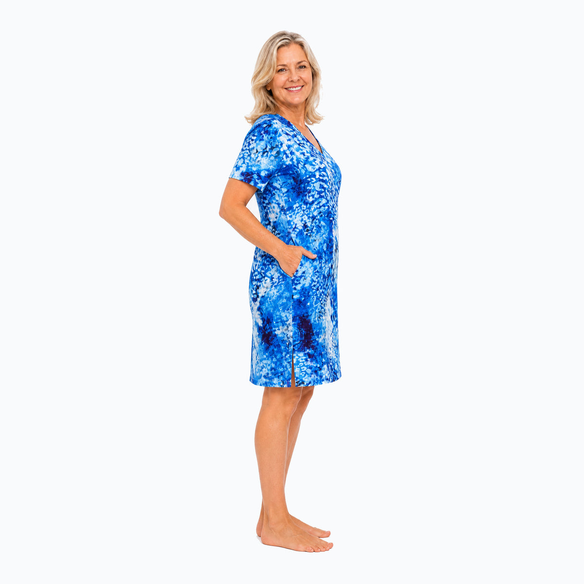 Woman wearing the Claire Powell Snowcat Shift Dress, side view