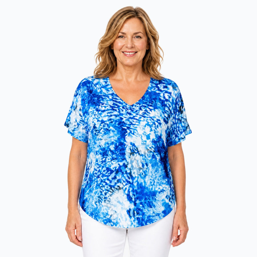 Woman wearing the Claire Powell Snowcat V-Neck T-Shirt, front view