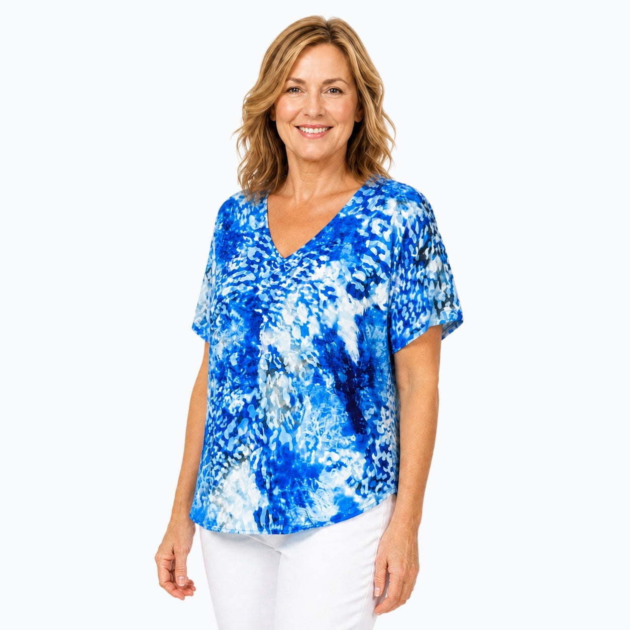 Woman wearing the Claire Powell Snowcat V-Neck T-Shirt, three-quarter view