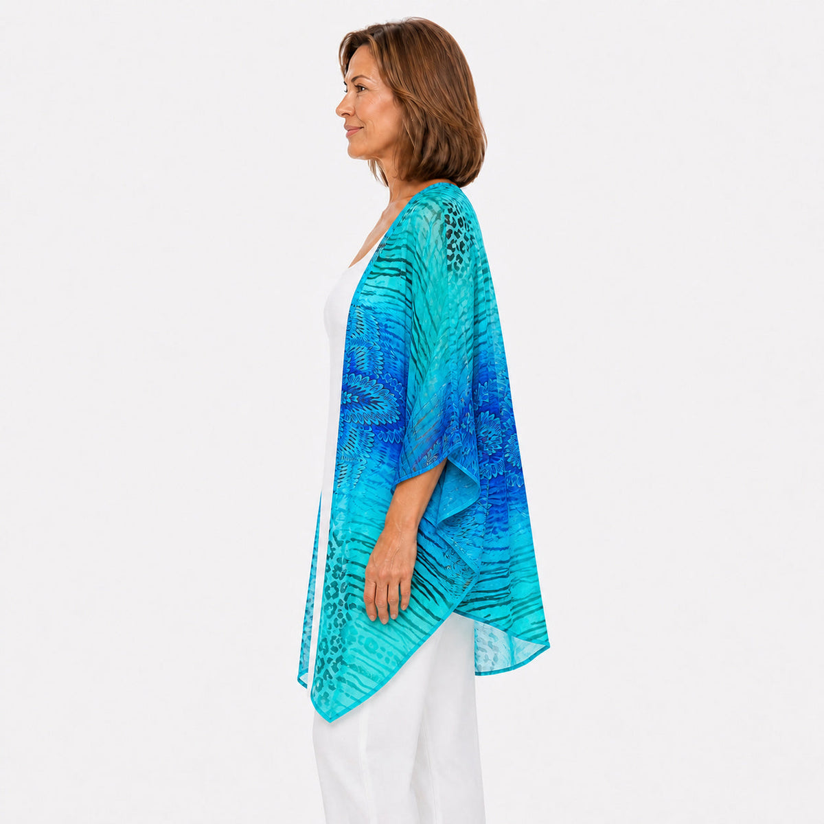 Woman wearing the Claire Powell Spray Cotton Chiffon Kimono Cover-Up, side view