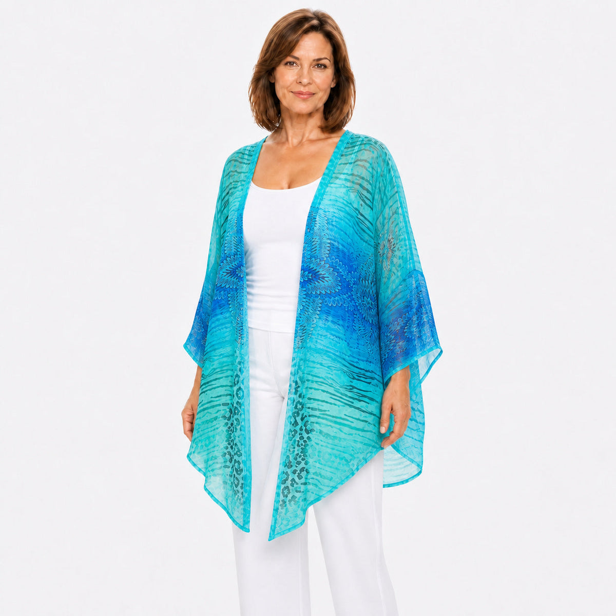Woman wearing the Claire Powell Spray Cotton Chiffon Kimono Cover-Up, three-quarter view