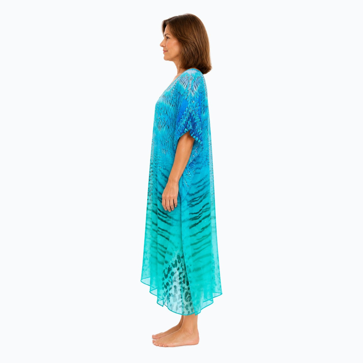 Claire Powell Spray midi kaftan dress on a mature woman, side view