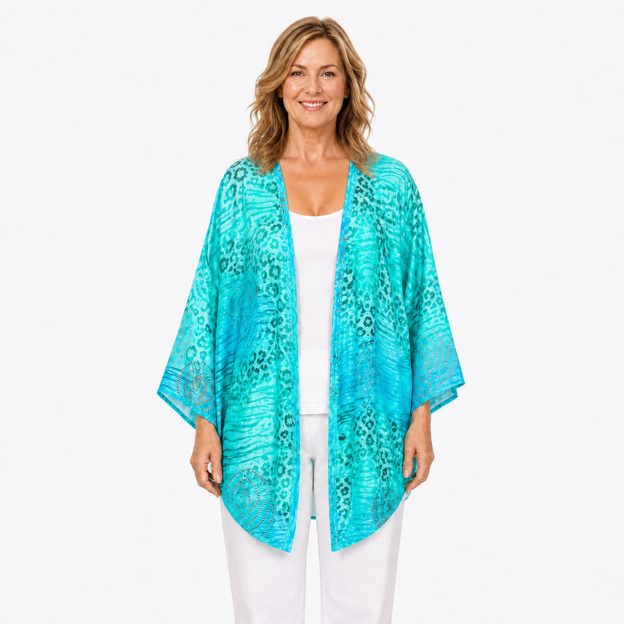 Woman wearing the Claire Powell Spray Modal Kimono Cover-Up, front view