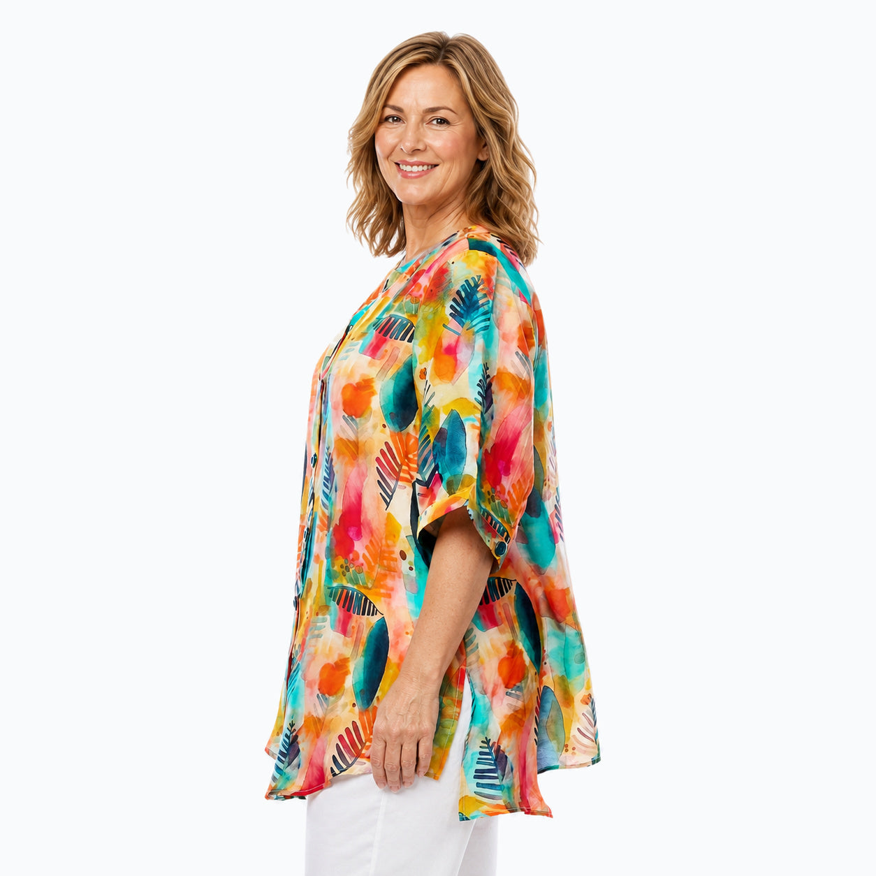 Woman wearing the Claire Powell Tropicana A-Line Tunic Shirt, side view
