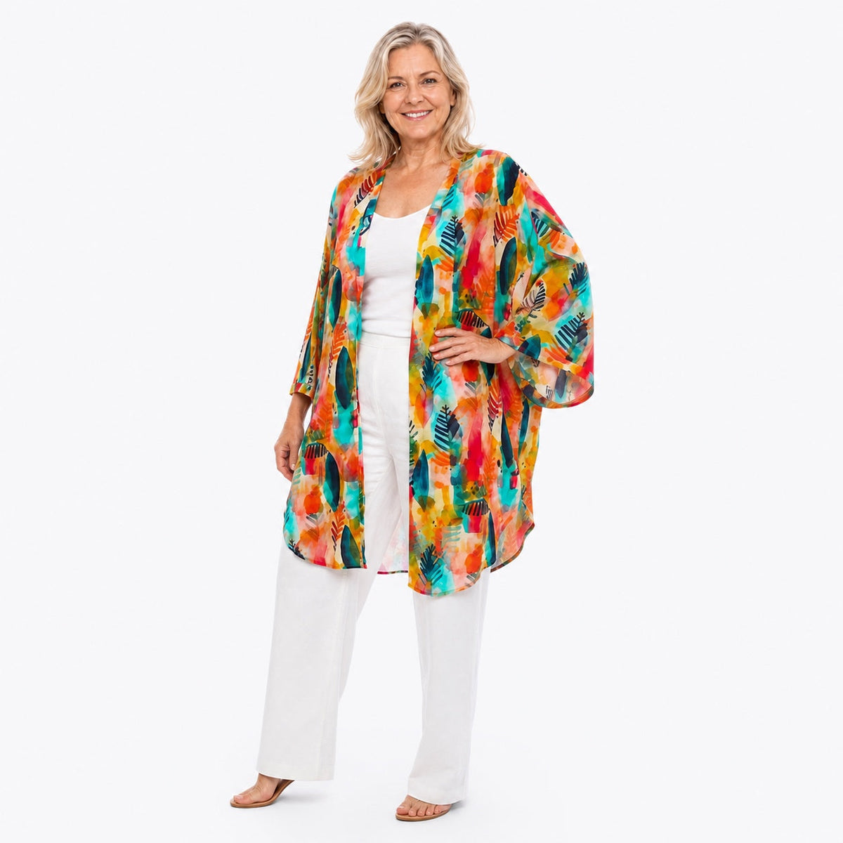 Woman wearing the Claire Powell Tropicana Modal Kimono Cover-Up, fashion pose