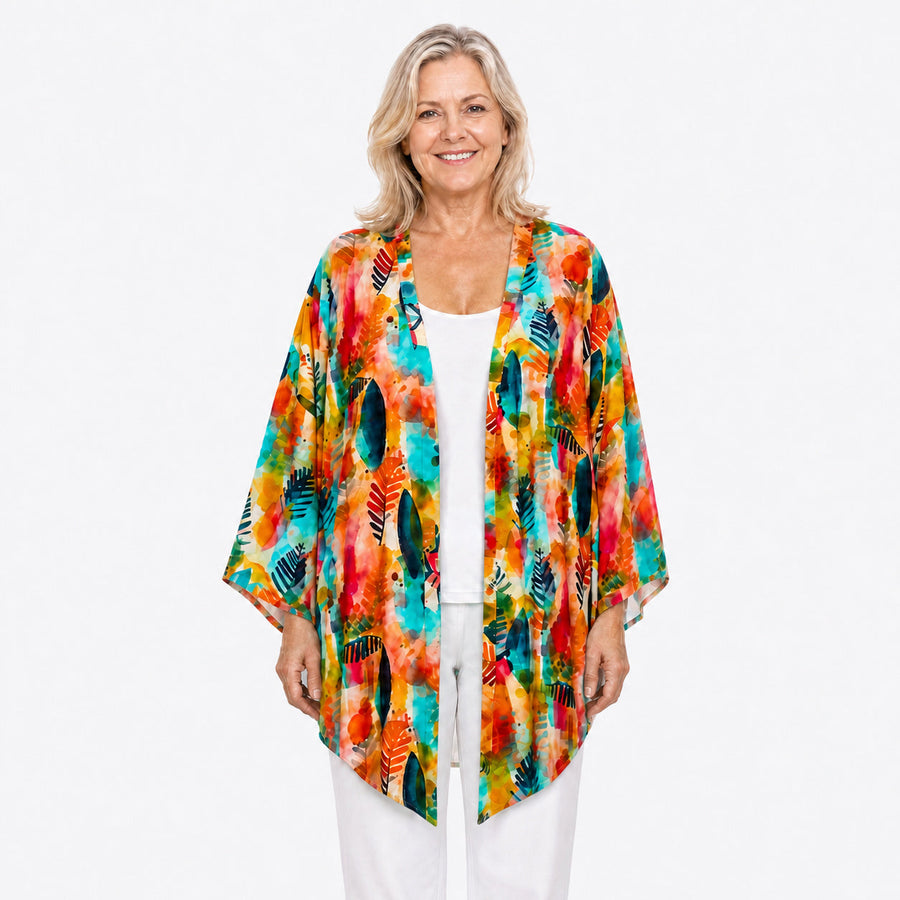 Woman wearing the Claire Powell Tropicana Modal Kimono Cover-Up, front view