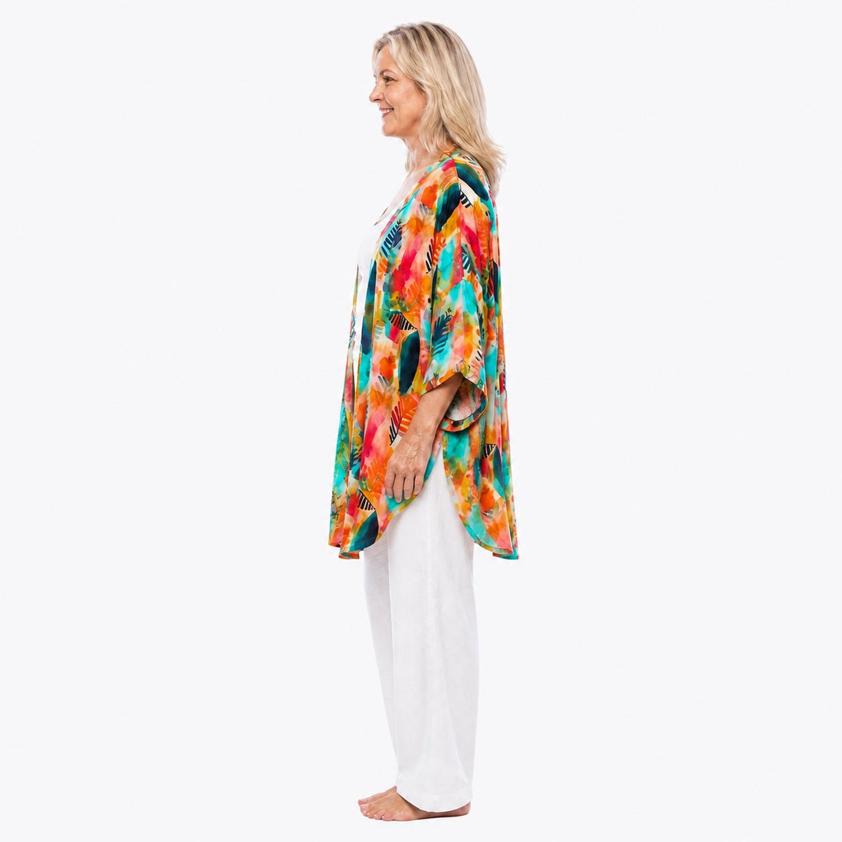 Woman wearing the Claire Powell Tropicana Modal Kimono Cover-Up, side view