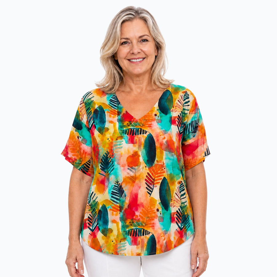 Woman wearing the Claire Powell Tropicana V-Neck T-Shirt, front view