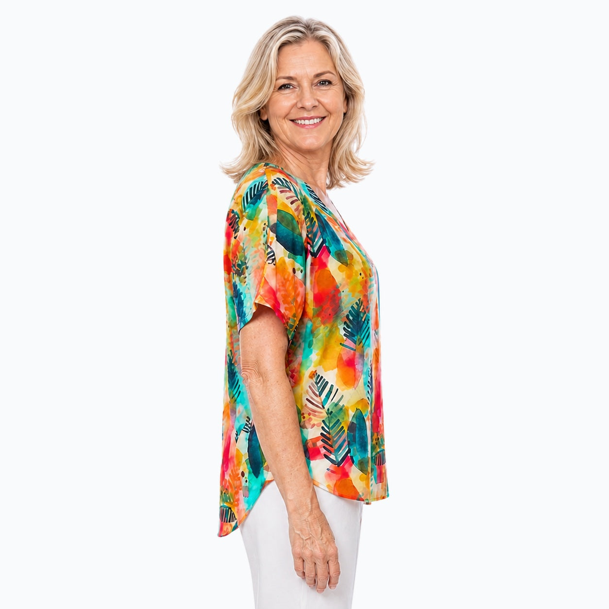 Woman wearing the Claire Powell Tropicana V-Neck T-Shirt, side view