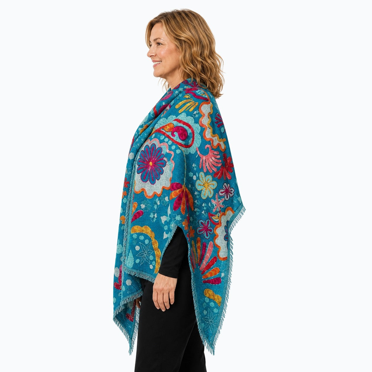 Woman wearing the Claire Powell Turquoise Wool Shawl, side view