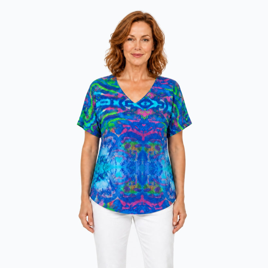 Woman wearing the Claire Powell Mirage V-Neck T-Shirt, front view
