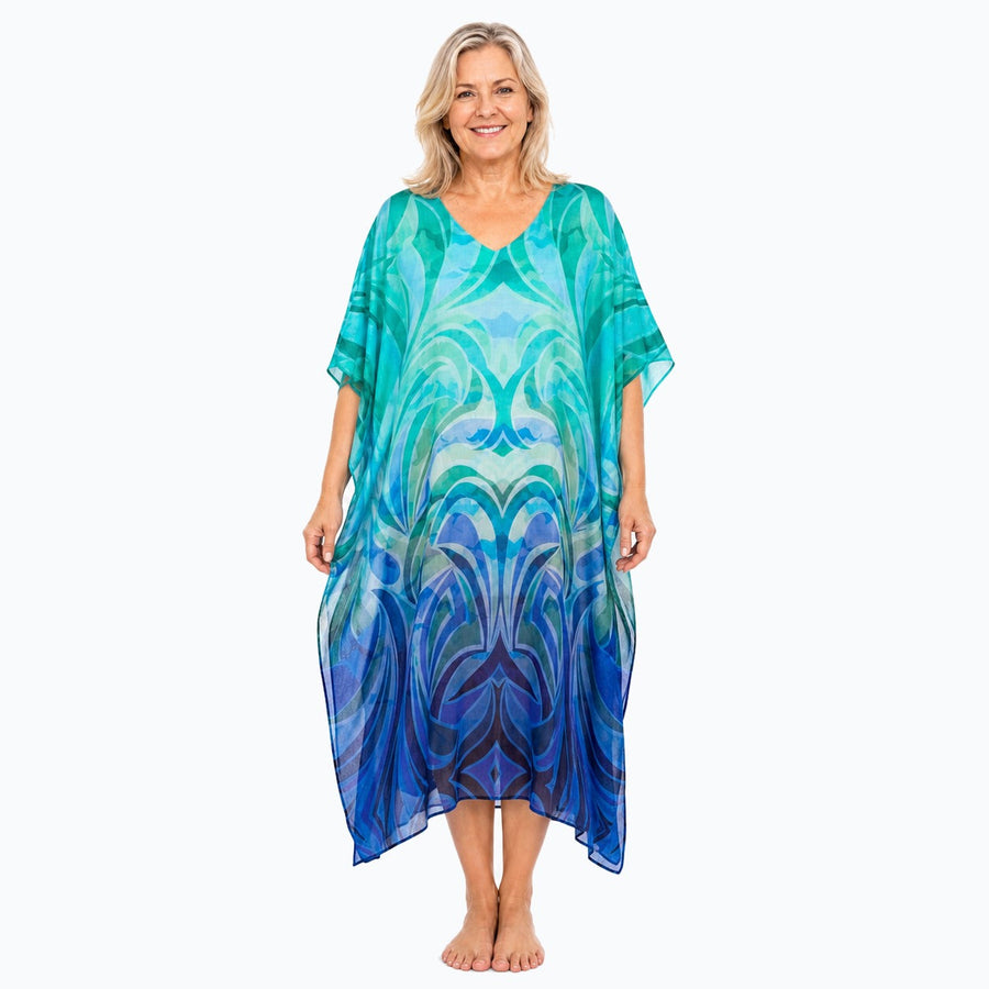 Claire Powell Waves midi kaftan dress on a mature woman, front view