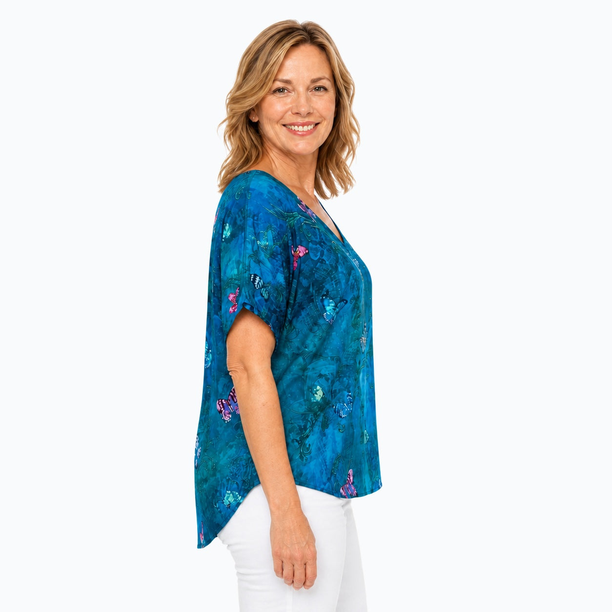 Woman wearing the Claire Powell Whisper V-Neck T-Shirt, side view