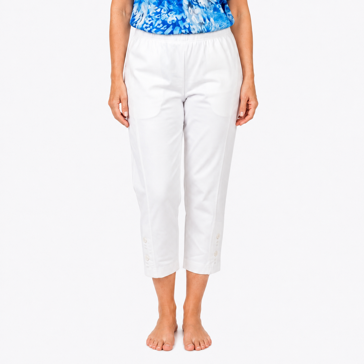 Claire Powell White Cotton Lycra Capri Pants on approved Model B, waistband, button hem and bare-feet detail