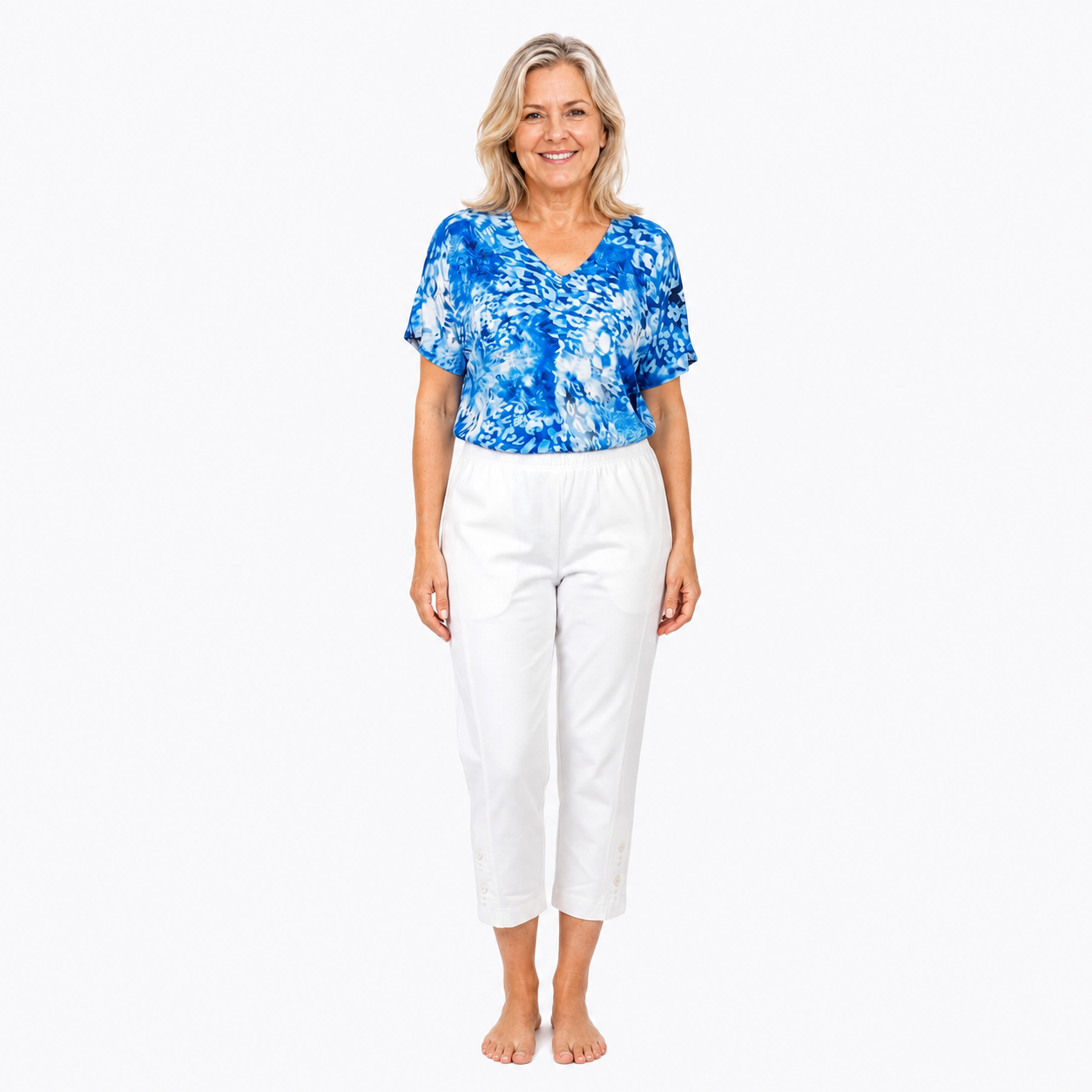 Approved Model B wearing Claire Powell White Cotton Lycra Capri Pants, barefoot front view