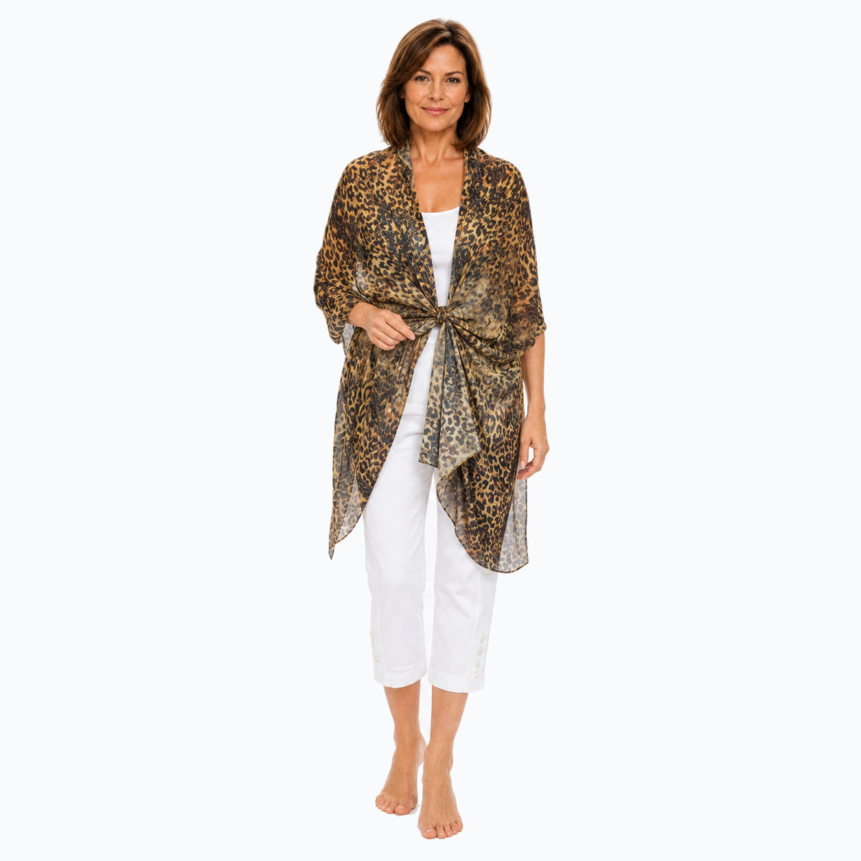 Woman wearing the Claire Powell Wilden scarf, full body view with white camisole and white capri pants