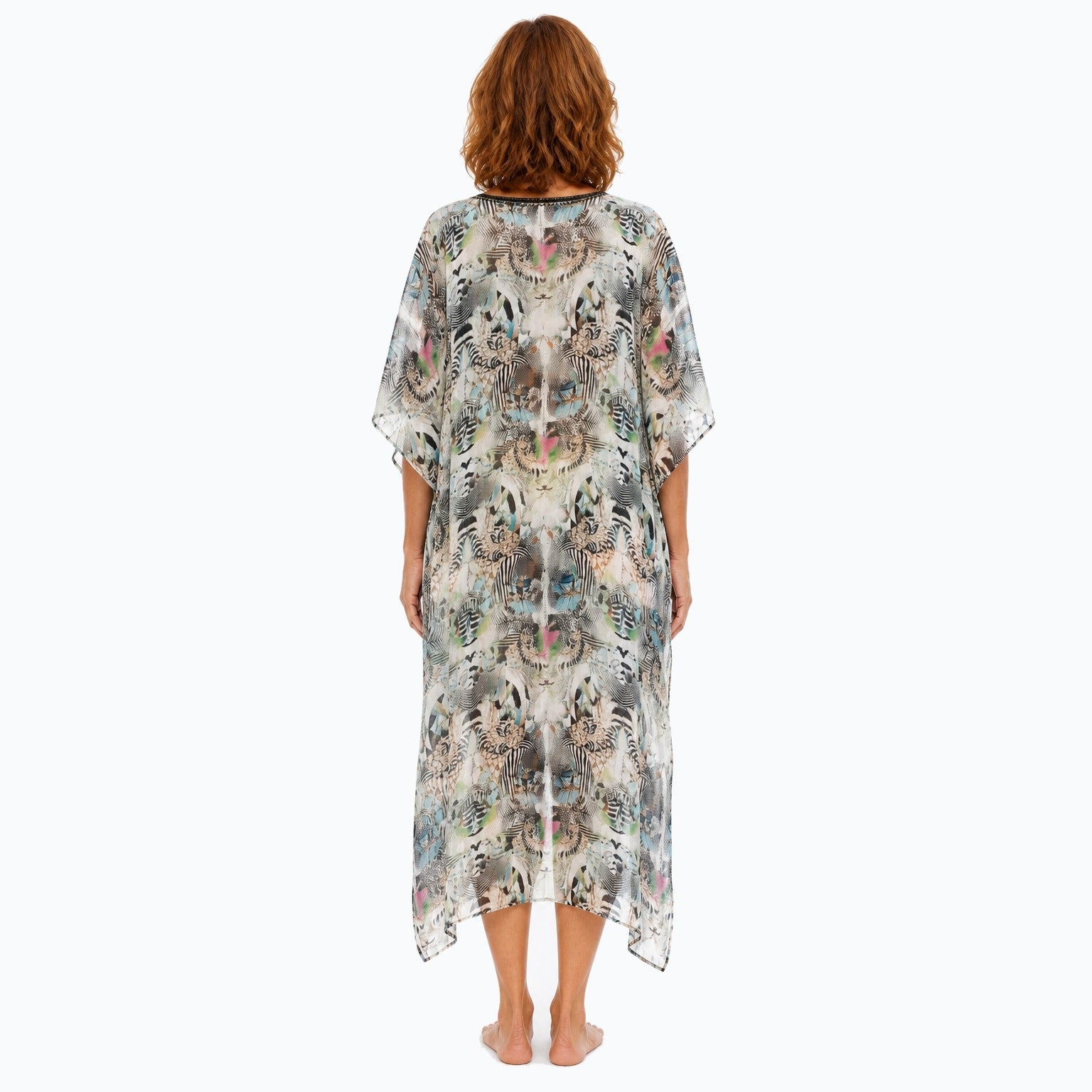 Claire Powell Zebra midi kaftan dress on a mature woman, back view