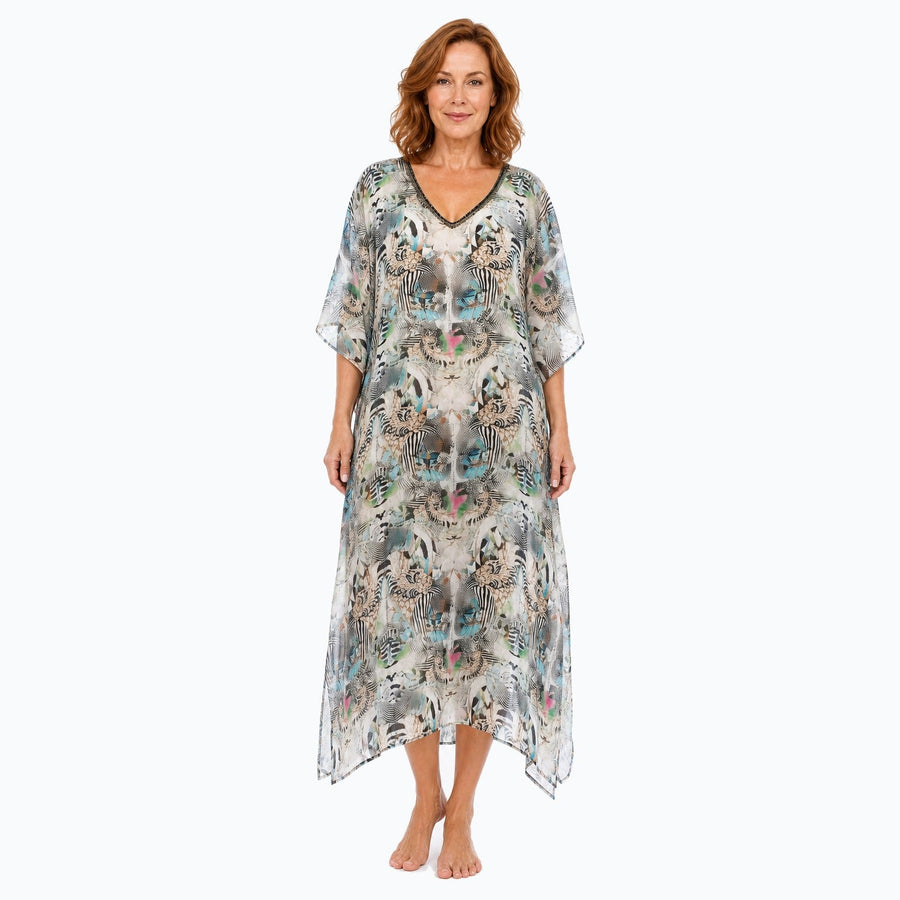 Claire Powell Zebra midi kaftan dress on a mature woman, front view