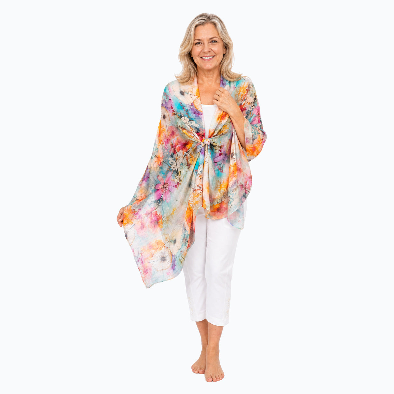 Claire Powell Zen scarf tied shoulder wrap, full-body view with white capri pants and bare feet