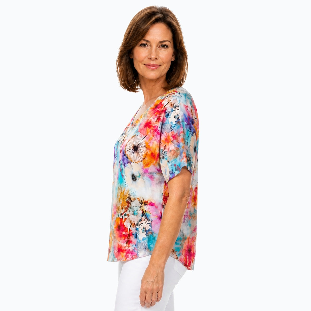 Woman wearing the Claire Powell Zen V-Neck T-Shirt, side view