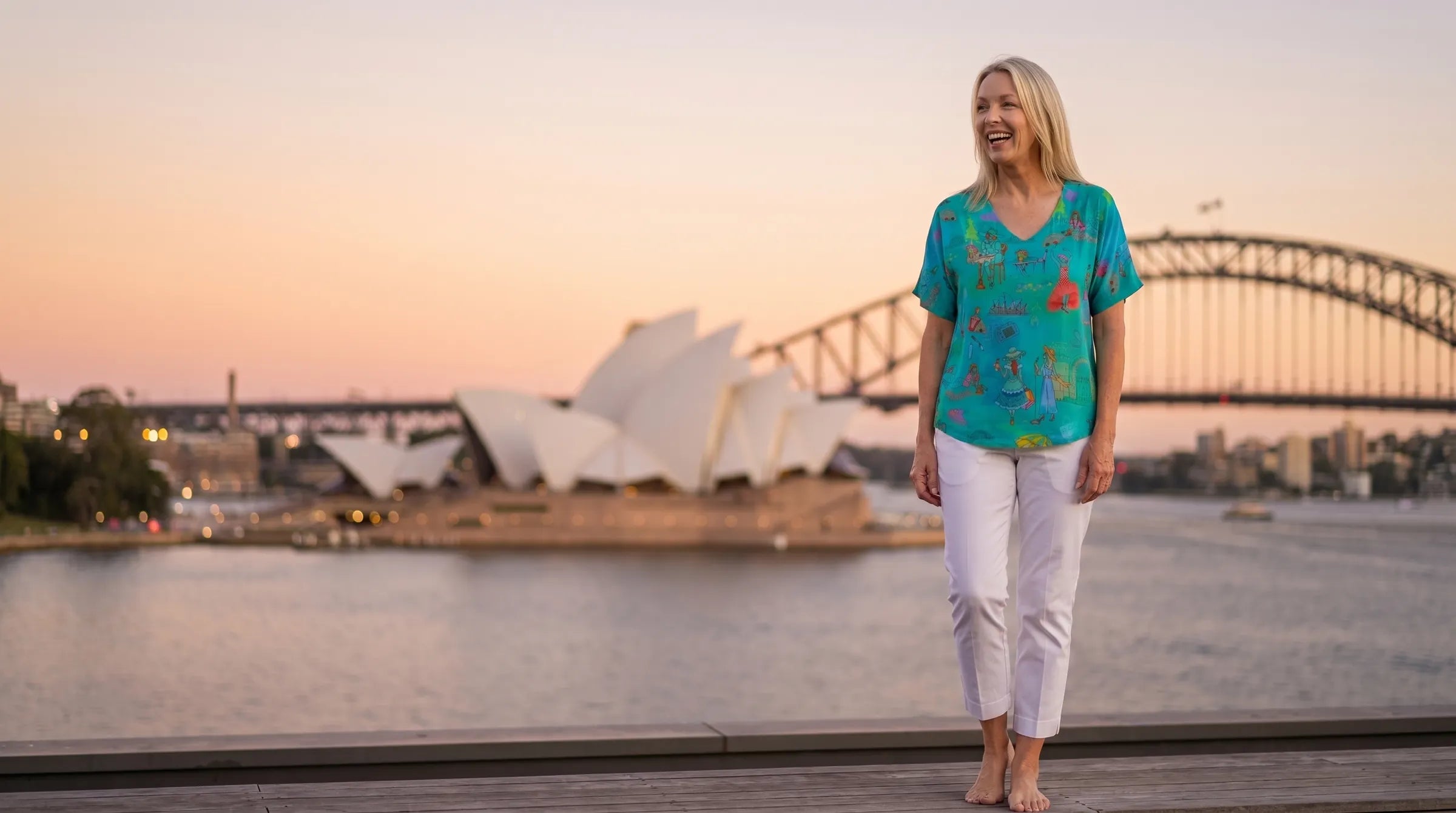 Claire Powell model wearing the Sirens T-shirt at Sydney Harbour