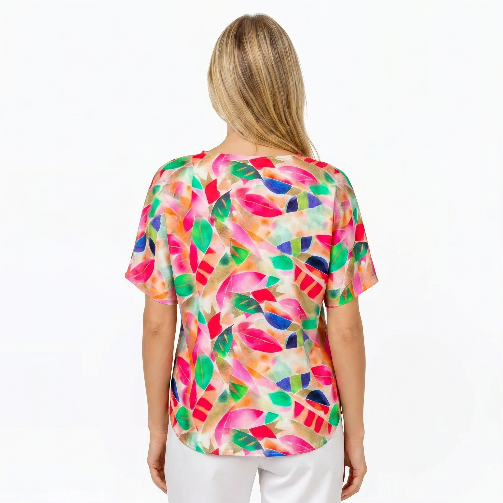 Woman wearing Claire Powell V-Neck T-Shirt in La Peach print, back view, white studio background