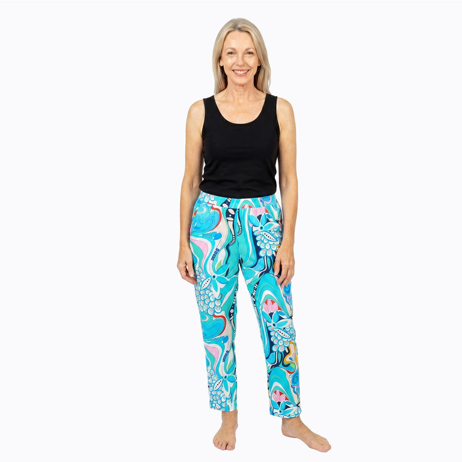 Woman wearing Claire Powell Cotton 7/8 Pants in Sakura print, front view